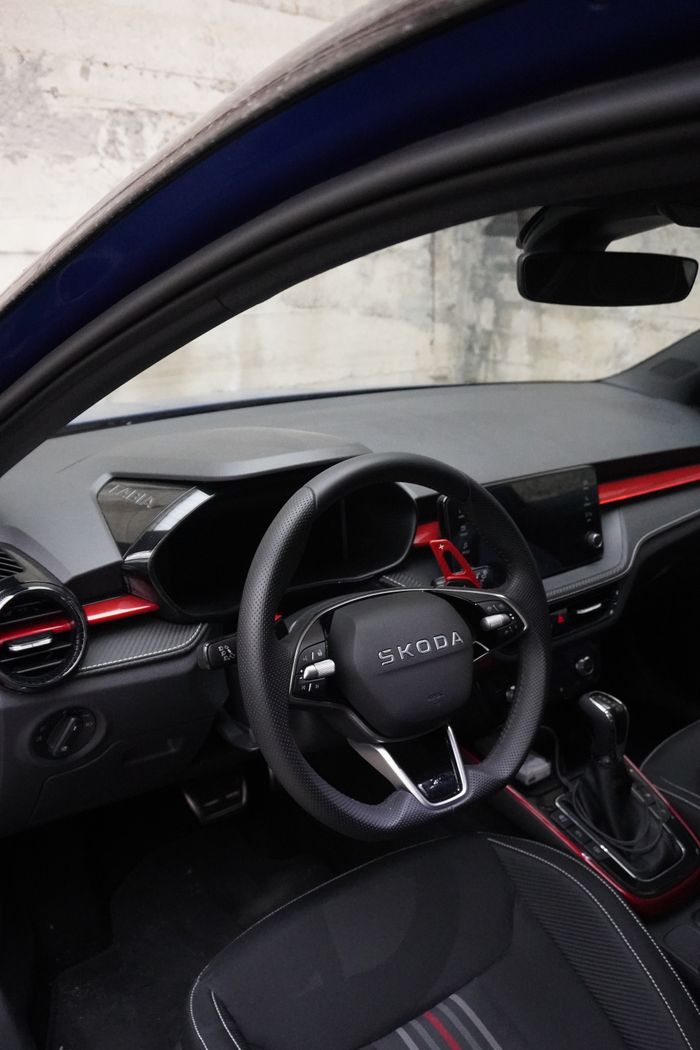 Explore the sleek and sporty interior of a modern Skoda vehicle, showcasing premium features.